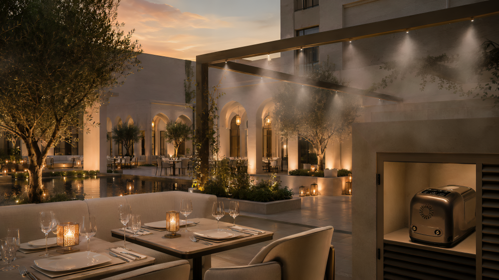 Rooftop restaurant terrace with city skyline at sunset — MW-300 hospitality cooling