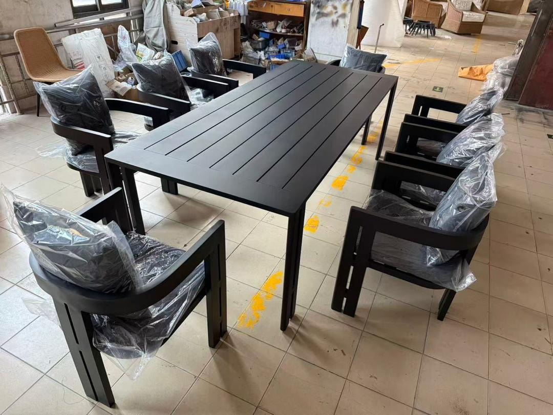 Custom black outdoor dining table with 6 chairs