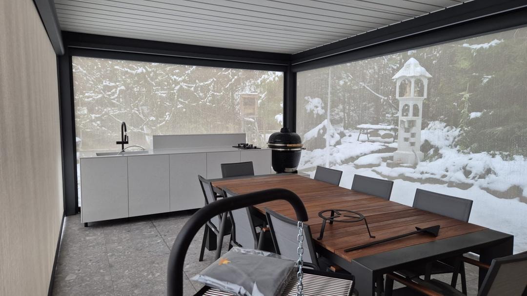 Outdoor kitchen with winter enclosure panels
