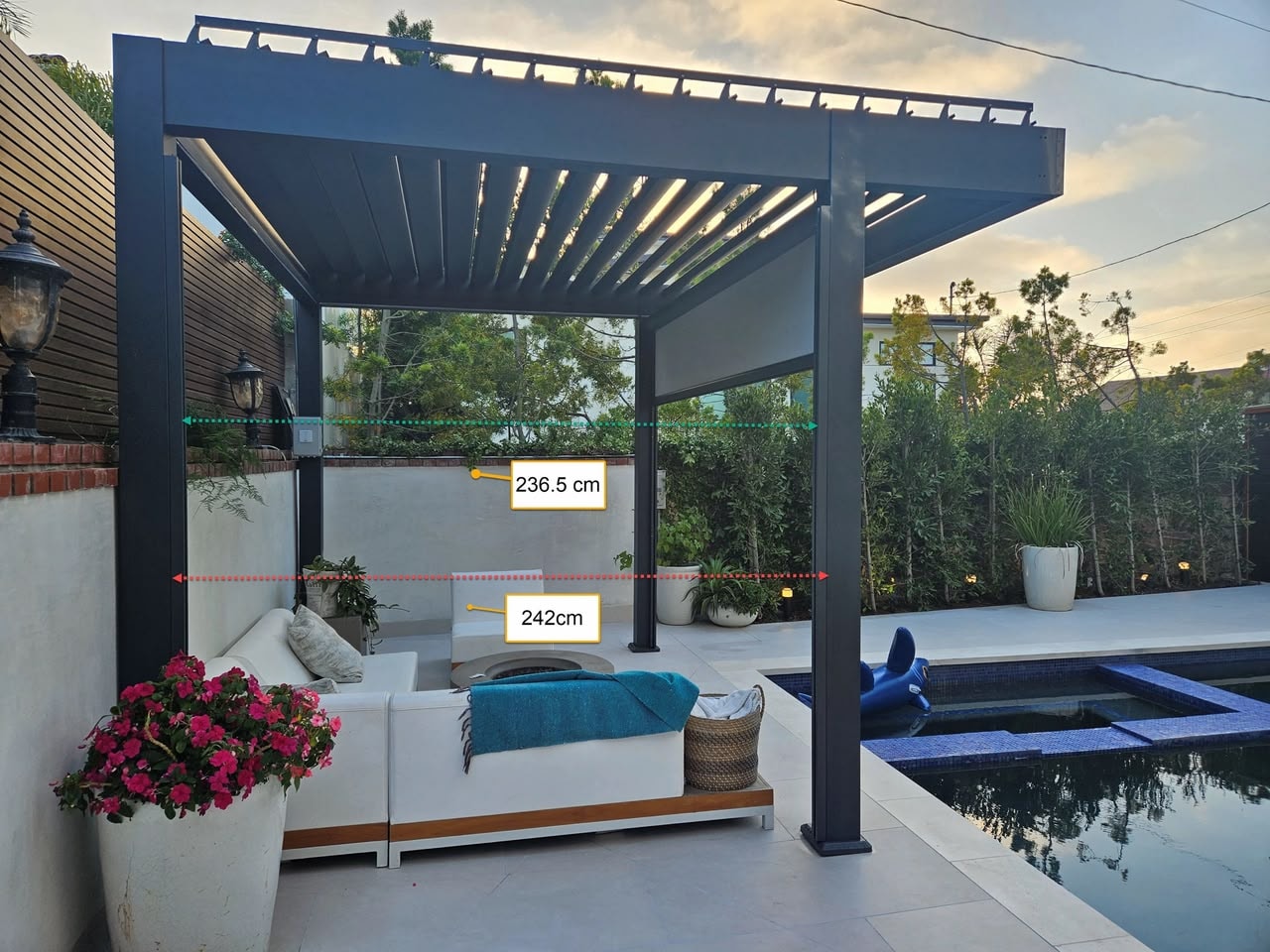 Louvered pergola interior with garden dining